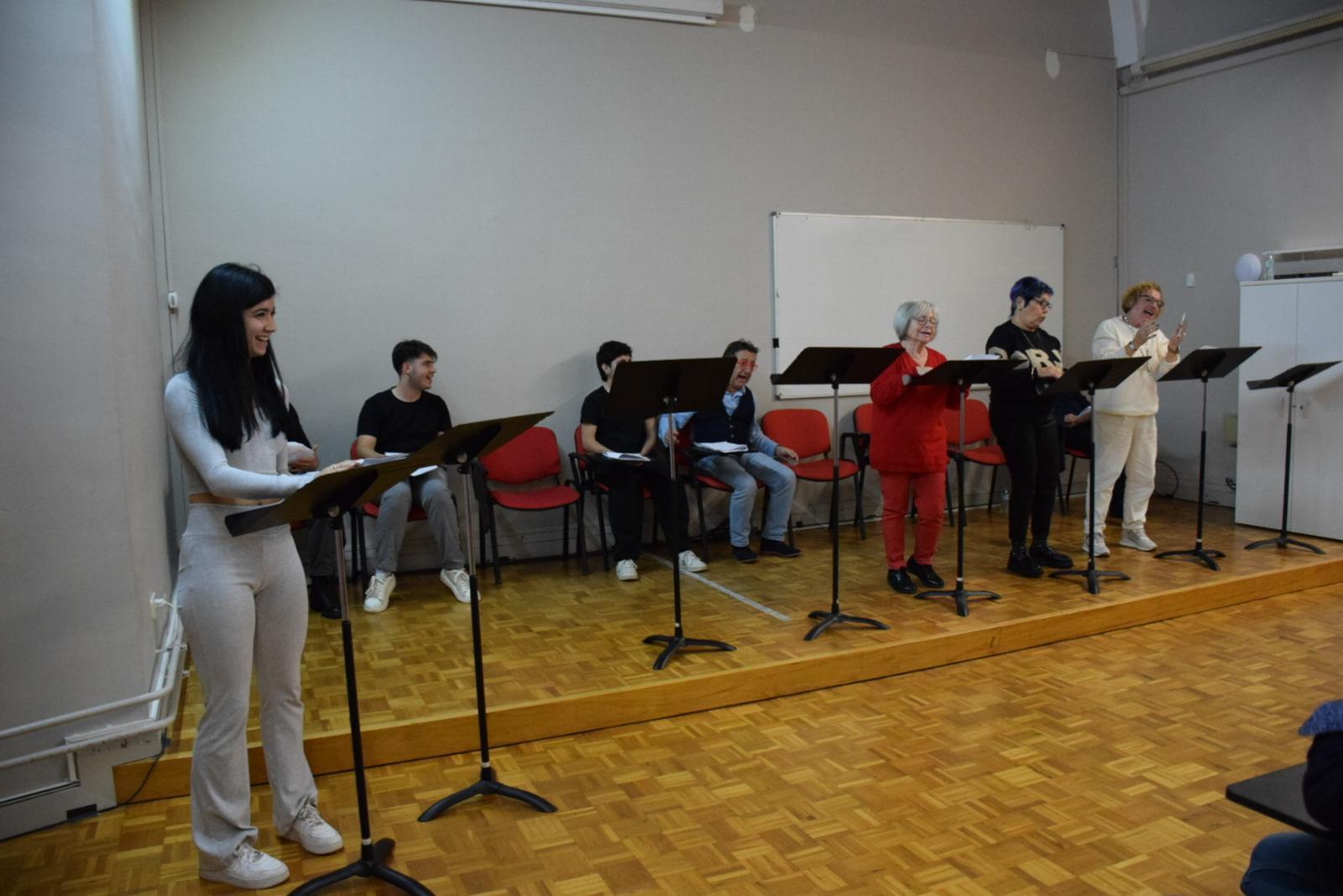 Participants in the drama workshop hear their texts at El Galliner